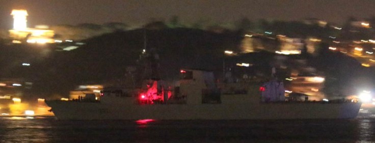 Canadian frigate Fredericton making a night time northbound passage through Istanbul. Photo: Yörük Işık.